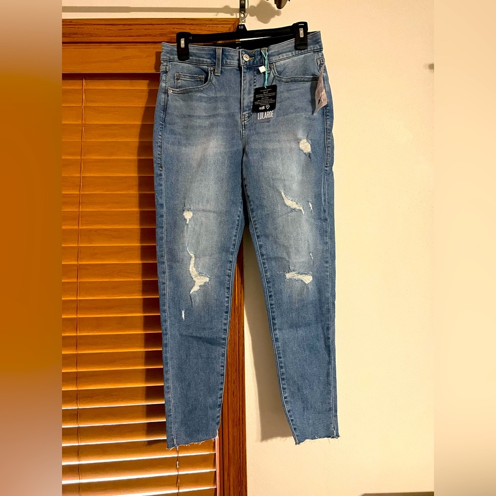 LuLaroe Distressed Skinny Jeans sz 28. Paid $70.